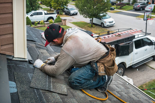 Professional Flat Roof Repair technician working in Keene, TX
